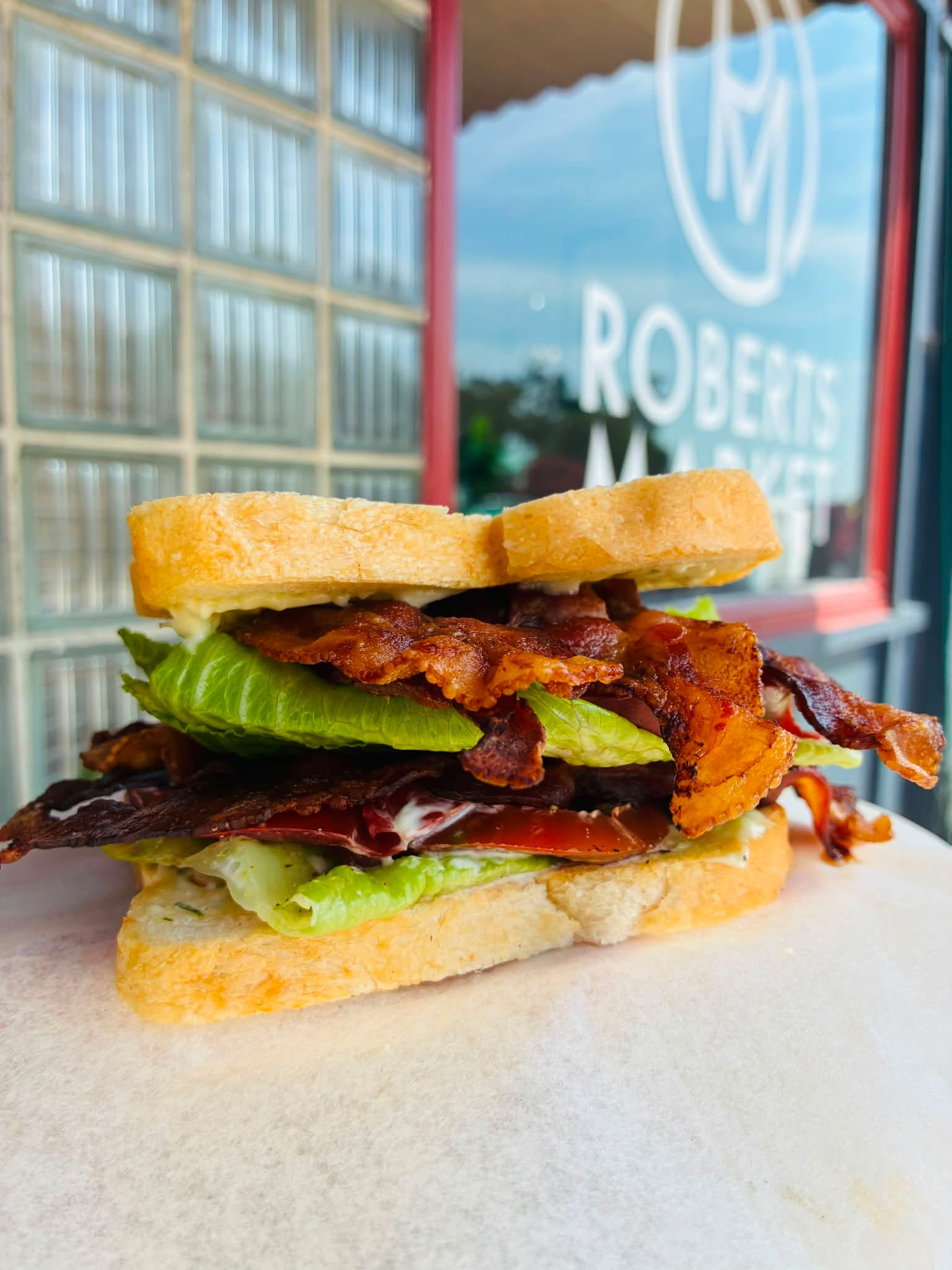 This little piggy went to (Roberts) market••• •MARKET BLT•🥓🥬🍅 Strong Arm sourdough, Mecklenburg Co. heirloom tomatoes, crispy bacon, herb aioli $11 This little piggy stayed home•••